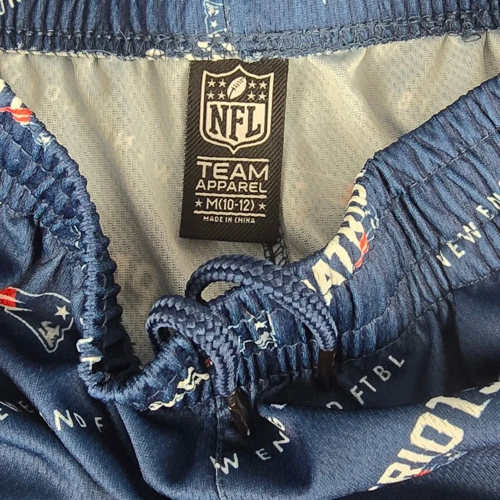 NFL Team Apparel Patriots Kids M Navy Blue Relaxed Fit All-Over Logo Shorts